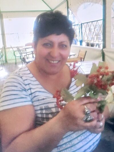  ,   Nelli, 63 ,  
